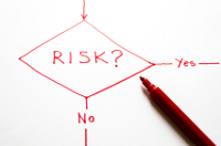 Ikona oceny ryzyka zawodowego. Schemat blokowy z pytaniem czy jest ryzyko i odpowiedziami Tak lub Nie.